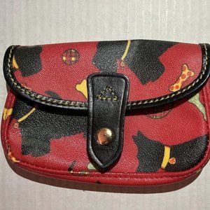 Dooney & Bourke coated canvas “Scotty” wristlet with leather trim